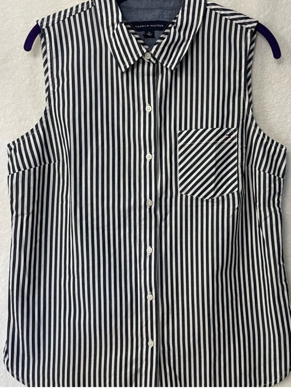 NWT size medium pin stripped sleeveless women’s top.